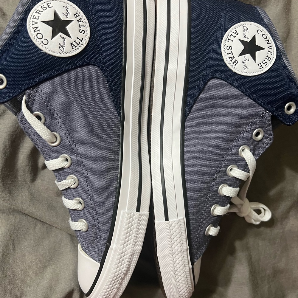 Brand new, never worn. Two-toned denim/navy converse.